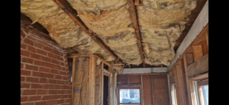 framing and insulation work in a house undergoing rehab work